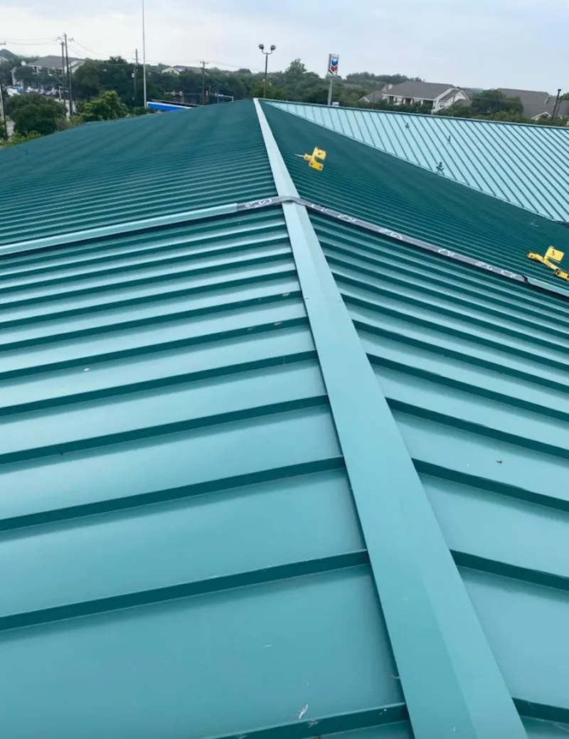 Green commercial metal roof ridge and valley for Metal Roof Repair in San Bernardino